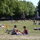 People enjoying warm weather during a heatwave in London. (Photo: Hollie Adams/Getty Images)