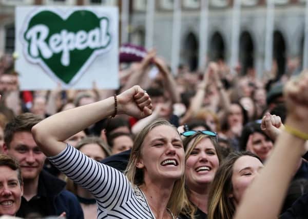 People celebrate at Dublin Castle as the official results of the referendum on the 8th Amendment of the Irish Constitution are announced in favour of the yes vote on: Saturday May 26, 2018. Photo: Brian Lawless/PA Wire