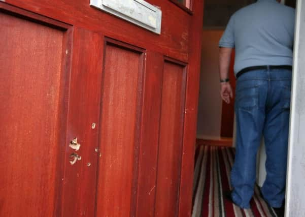 A shot was fired at the front door of the property on Woodburn Avenue, Carrickfergus around 9.30pm on Wednesday evening.