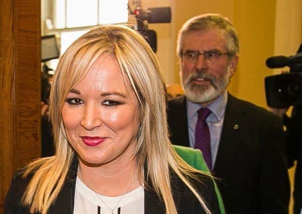 Sinn Fein's Michelle O'Neill and Gerry Adams